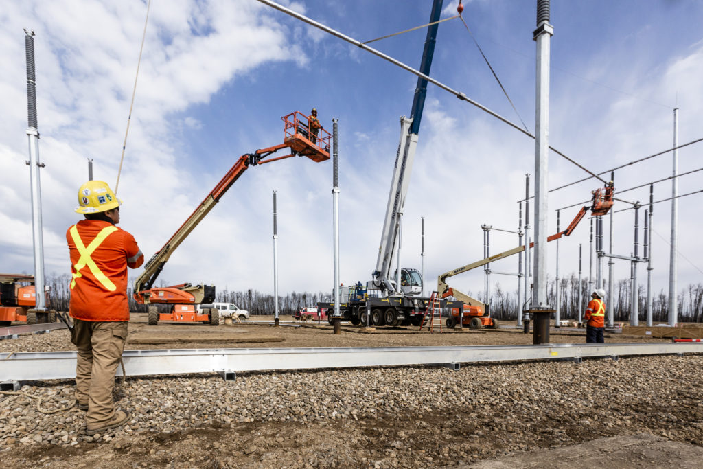Man overseeing substation job site